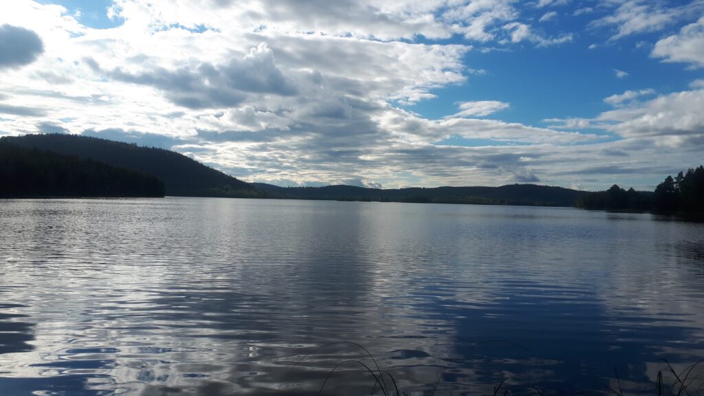 Beautiful lake close to off-grid solar power cabin